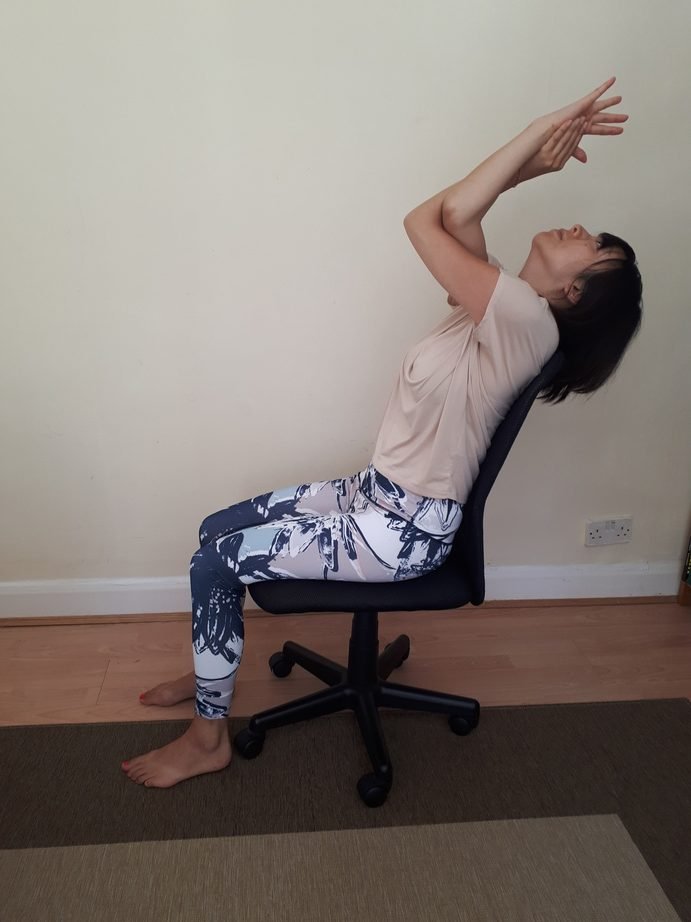 Chair Yoga Seated Eagle Arms Backbend